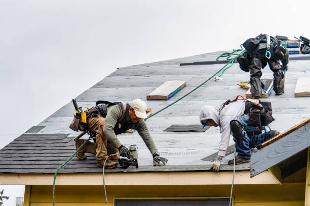 Professional Gutter Installation technician working in Reedsport, OR